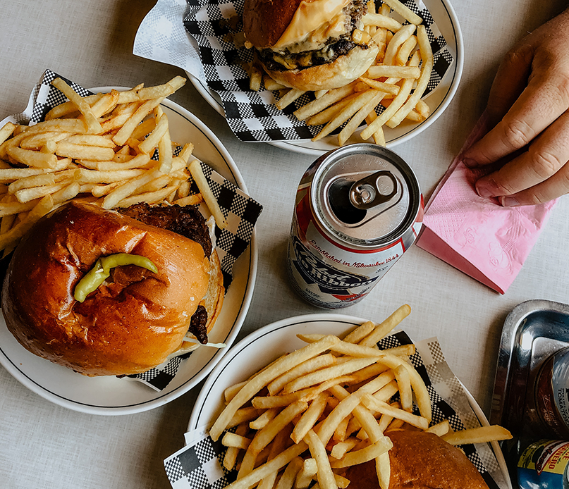 Burgers and fries at a restaurant